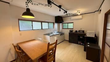 Fridge, microwave, stovetop, cookware/dishes/utensils