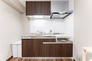 Fridge, microwave, cookware/dishes/utensils - 42 square meters | Deluxe Twin Room accommodates  / Kagoshima City Kagoshima (Kagoshima City)