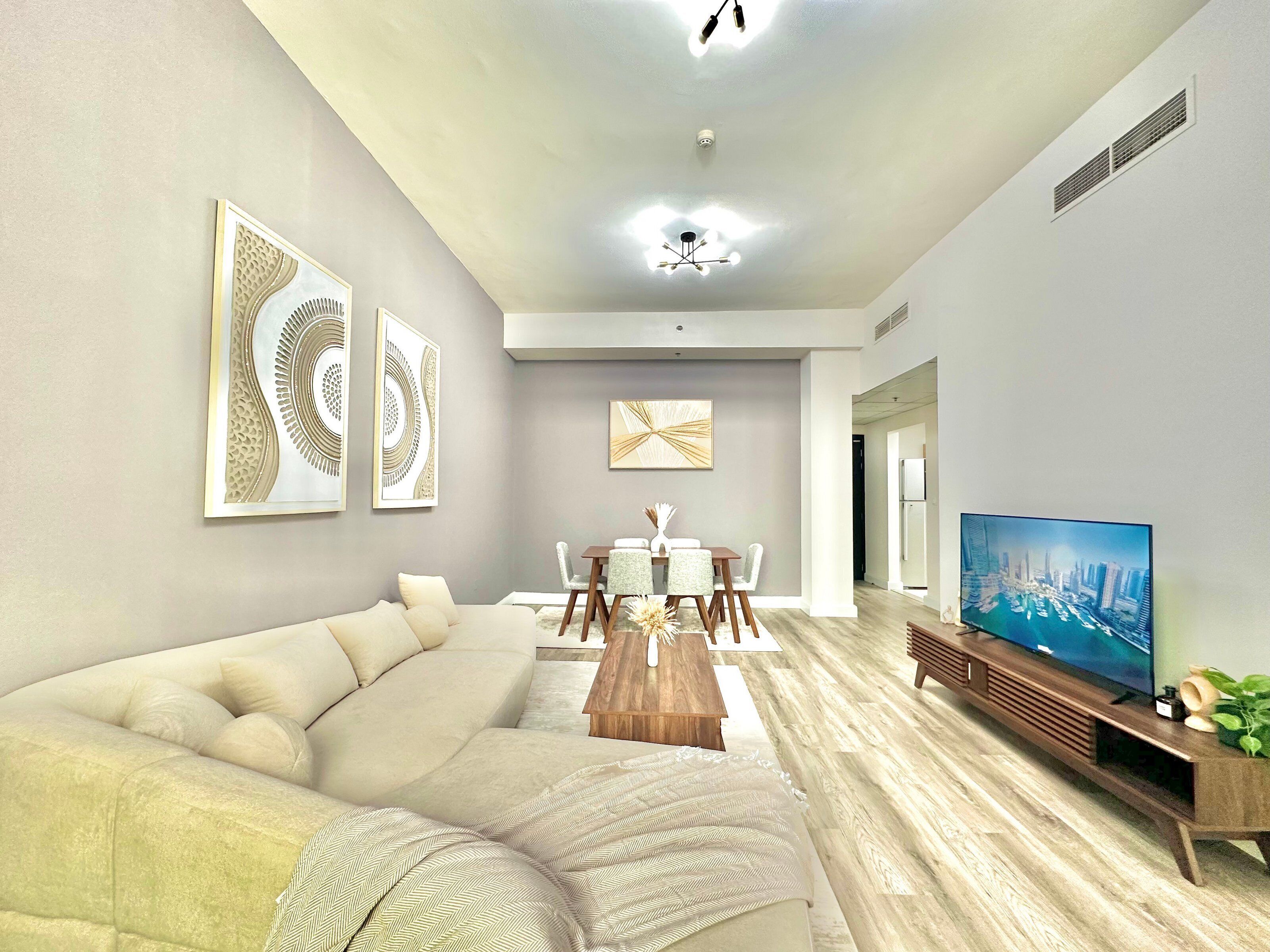 Standard Apartment | Living area | 42-inch Smart TV with satellite channels, Netflix, streaming services