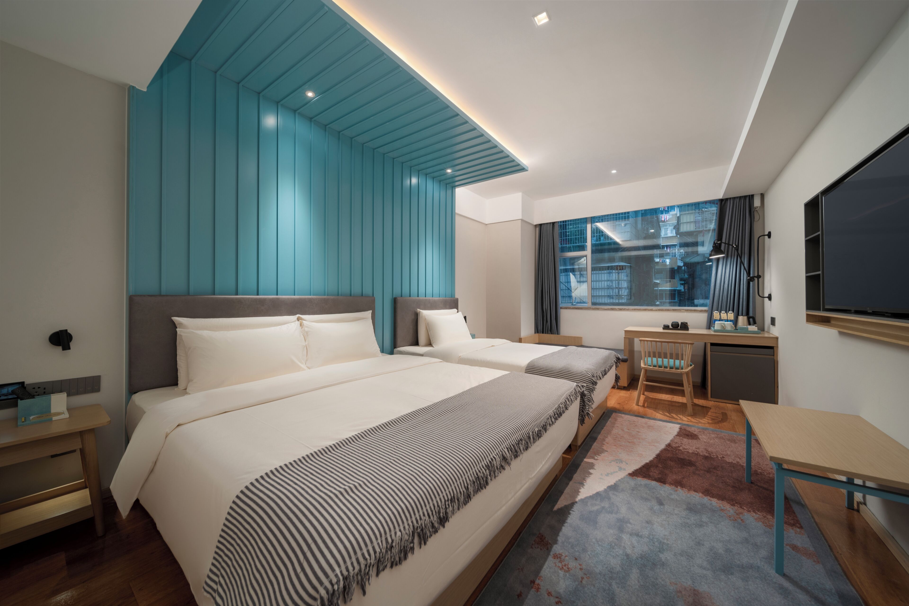 Family Twin Room, City View | In-room safe, iron/ironing board, free WiFi