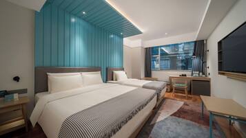 Family Twin Room, City View | In-room safe, iron/ironing board, free WiFi