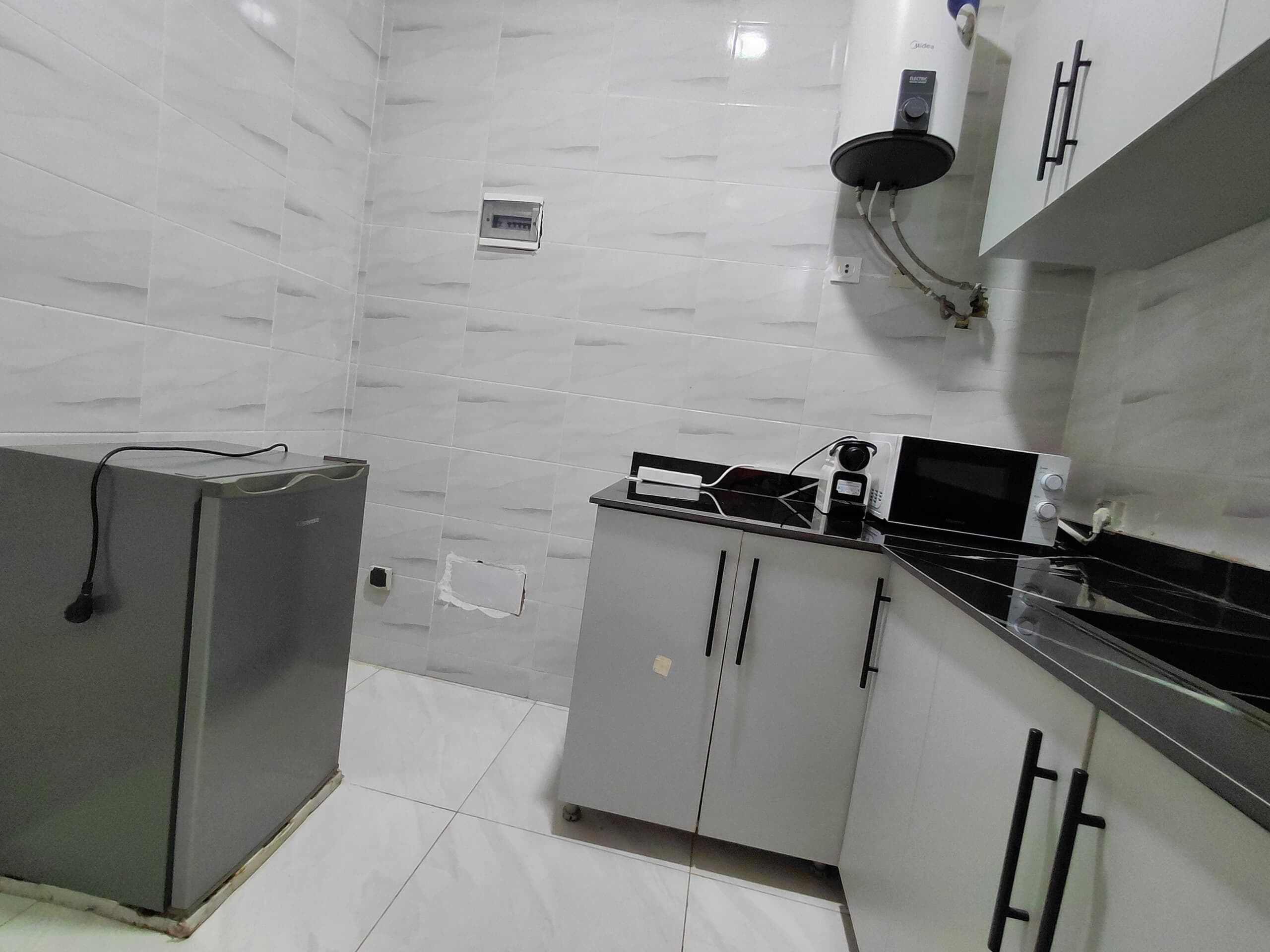 Attico Comfort, 1 camera da letto, balcone, vista città | Cucina privata | Frigorifero, microonde, forno, piano cottura