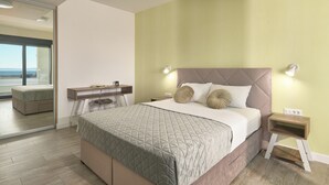 A bedroom with a bed, bedside tables, a desk, and a large window. - Luxury Villa Natali w Pool, Terrace and sea View (Podstrana)