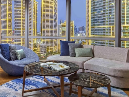 50-inch Smart TV with premium TV channels, Netflix, streaming services. Novotel Suites at Acqua