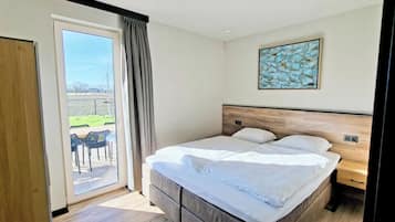 4 habitaciones, tabla de planchar con plancha, wifi y ropa de cama