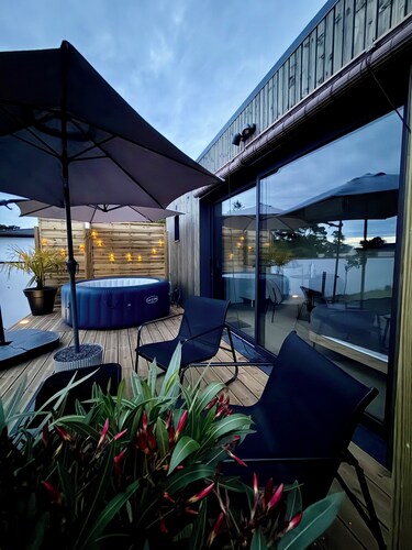 Lodge cosy avec jacuzzi privatif et climatisation