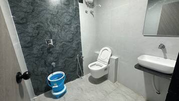 Deluxe Double Room, City View | Bathroom | Free toiletries, slippers, towels, soap
