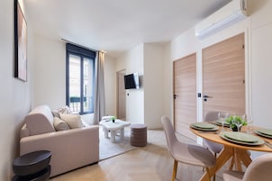 Apartamento Deluxe, vistas a la ciudad | Salón