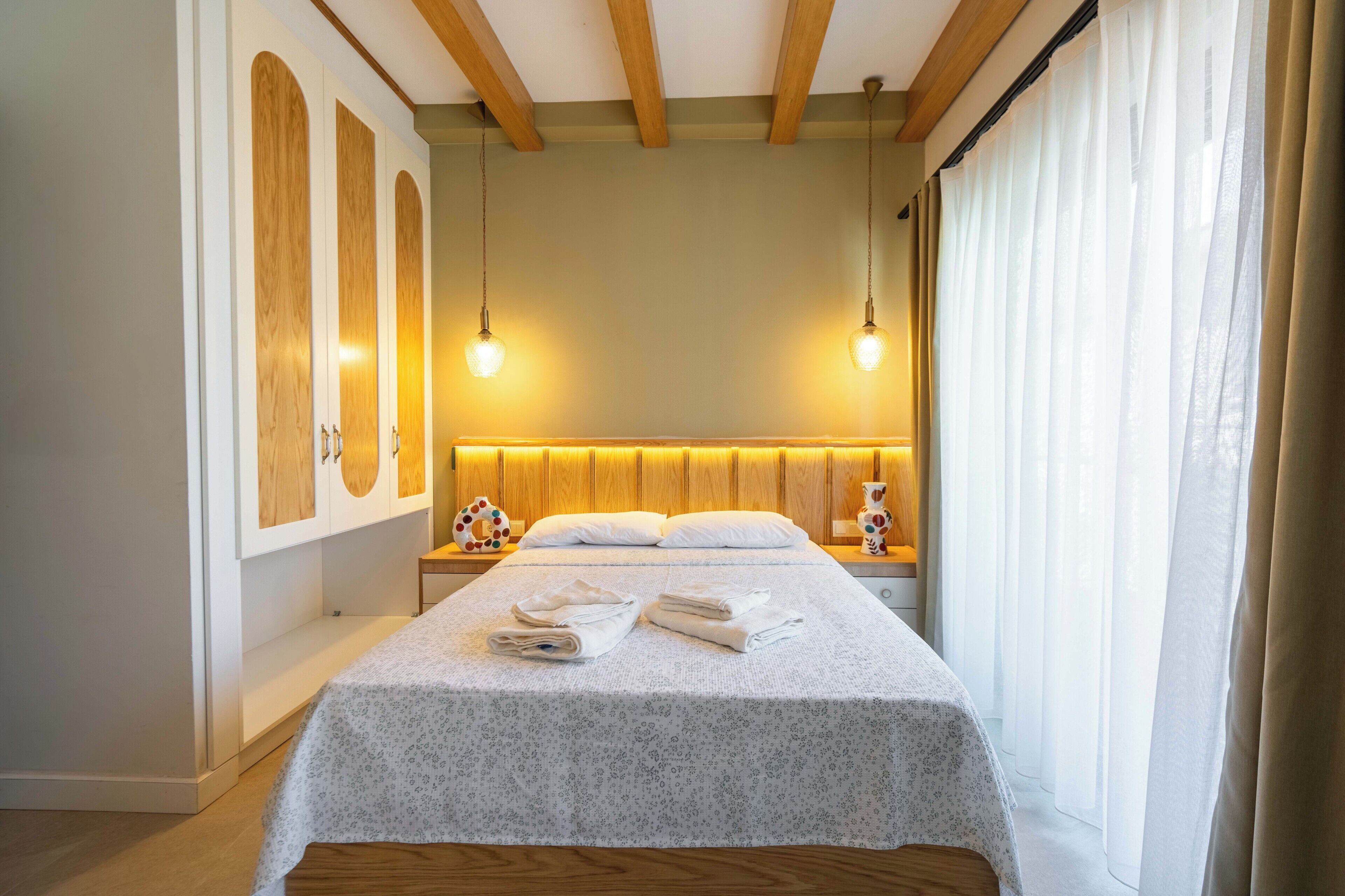 Luxury Room, Sea View | Desk, laptop workspace, blackout drapes, iron/ironing board