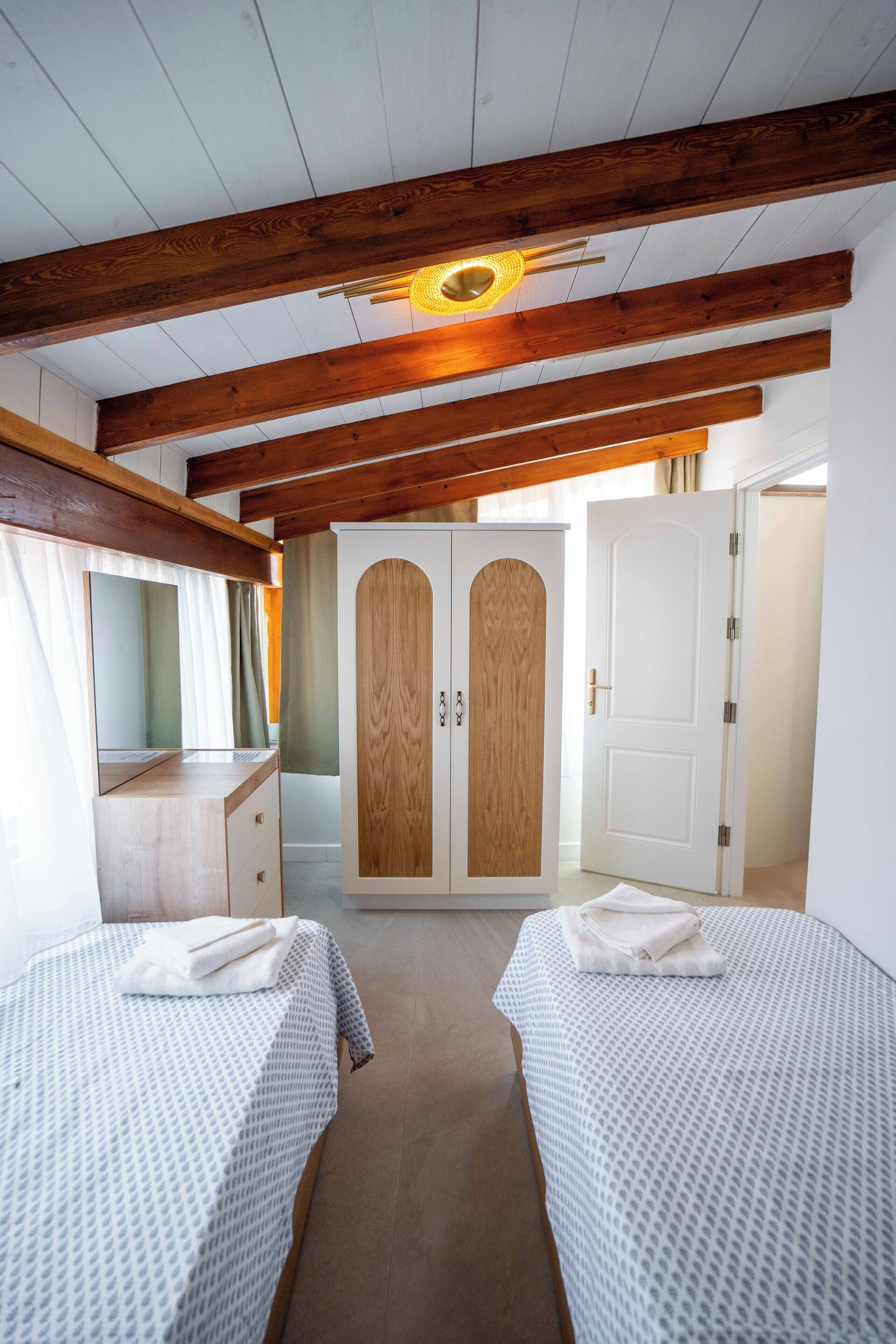 Family Suite, Balcony, Sea View | Desk, laptop workspace, blackout curtains, iron/ironing board