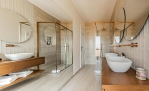Luxury Apartment, Balcony, Garden View | Bathroom | Shower, free toiletries, slippers, soap