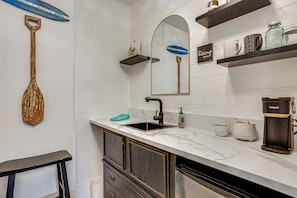 A bathroom with a sink, mirror, shelves with mugs, and a coffee maker. - Colorado Countryside Living 7 Mi to Chatfield Res! (Louviers)