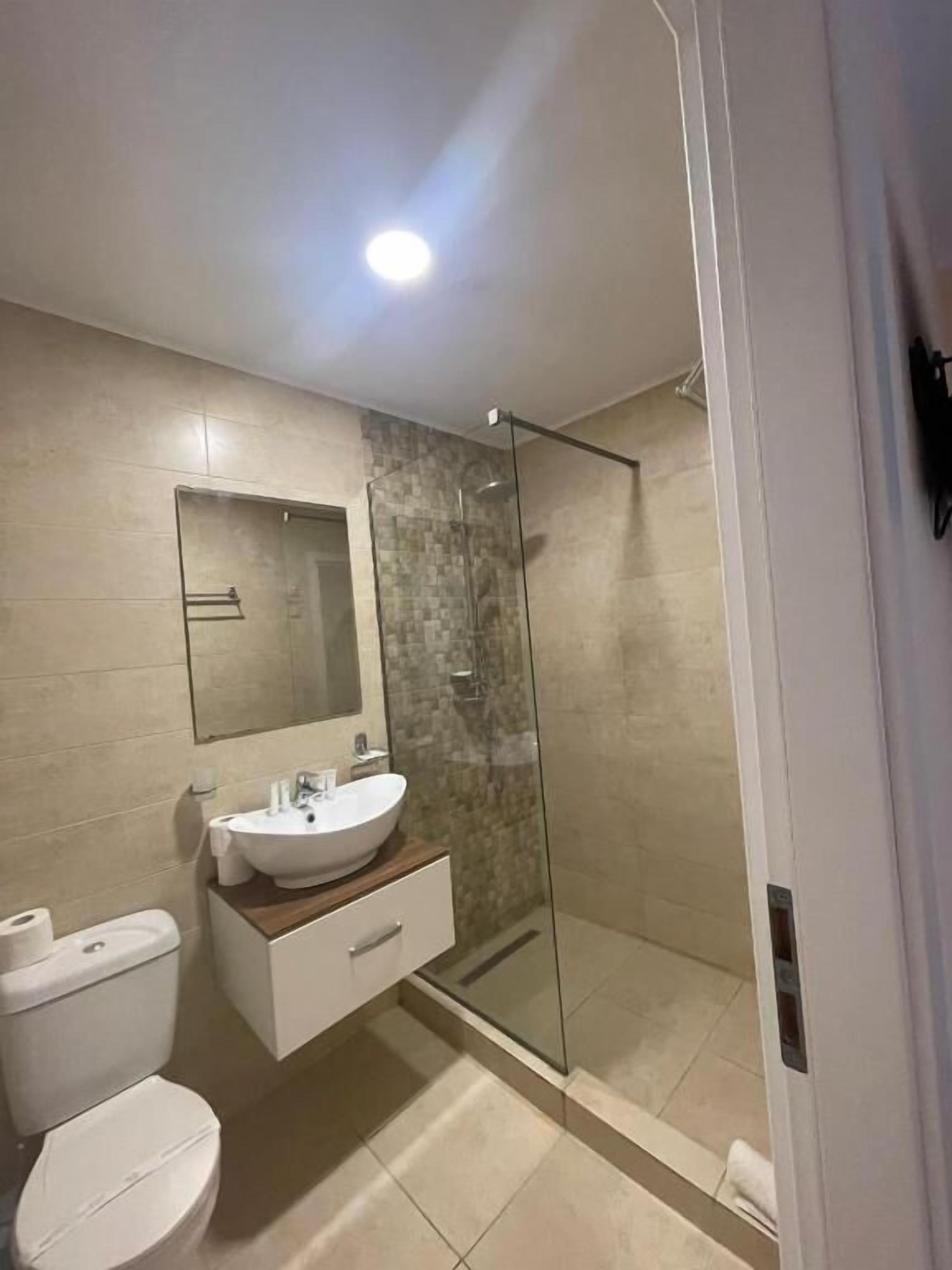 Suite, Balcony | Bathroom | Shower, free toiletries, towels, soap