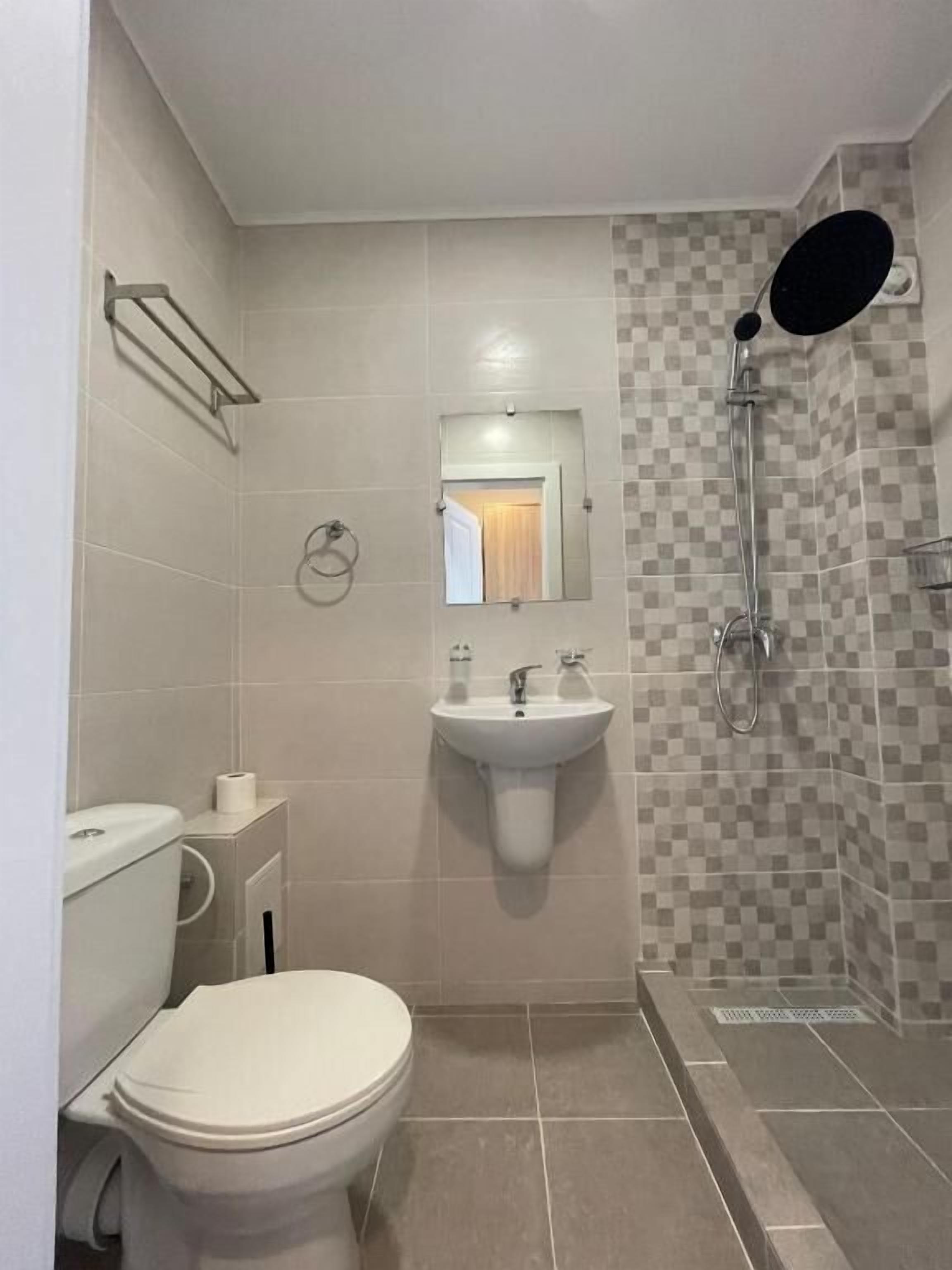 Deluxe Double Room, Balcony, Sea View | Bathroom | Shower, free toiletries, towels, soap