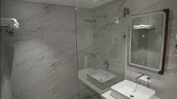Deluxe Double Room, Balcony, Hill View | Bathroom | Jetted tub, free toiletries, bathrobes, towels
