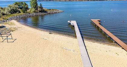 Spacious 4-bedroom home with private beach, dock, large yard, outdoor shower.