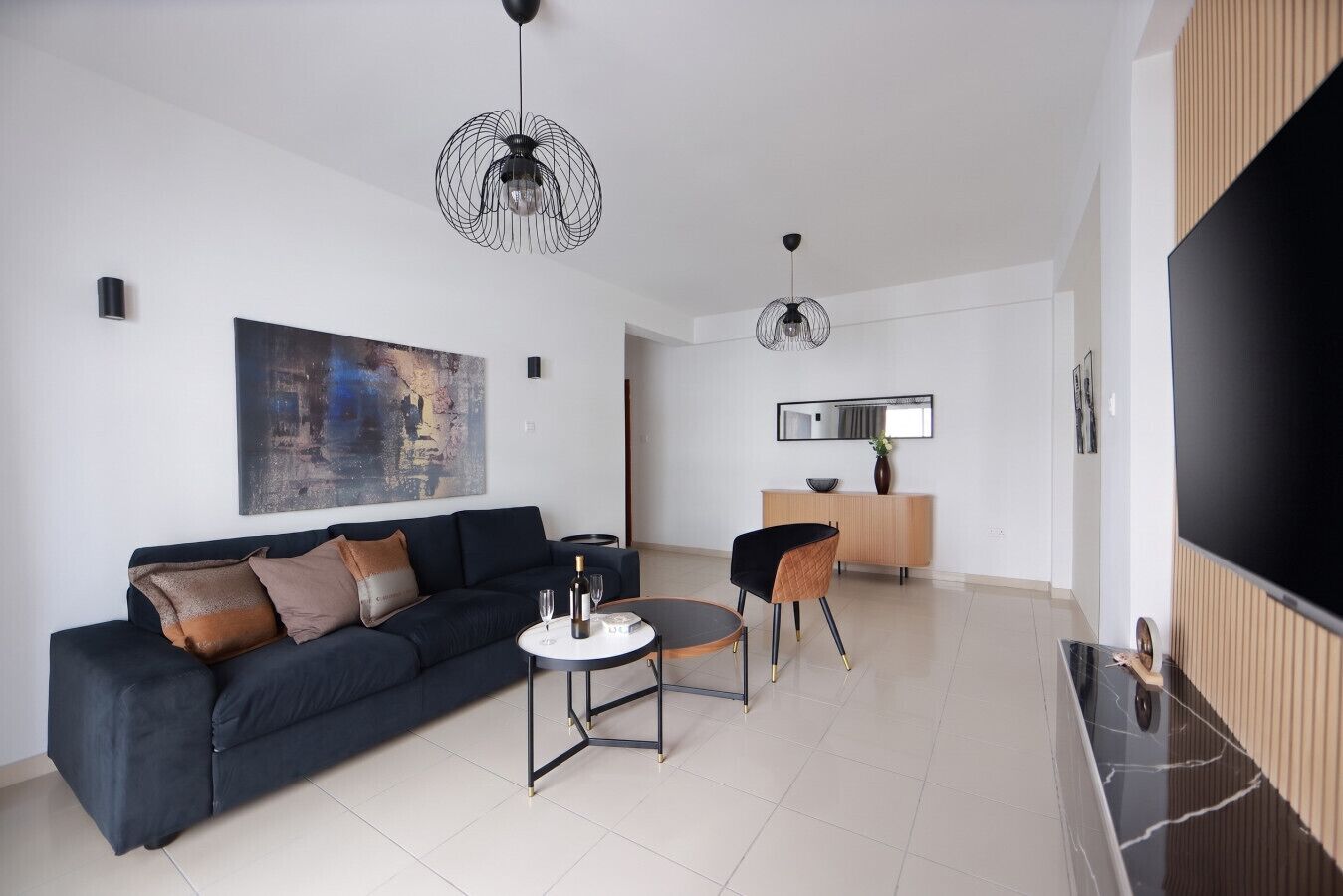 Bright and inviting living area with modern design, perfect for relaxing after a day of exploring.