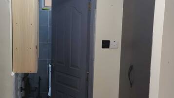 Shower, towels, soap, toilet paper