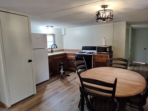Dining - 2-bedroom mobile home w/ AC at Elkwood Campground in Wolverine, MI with POOL! (Wolverine)