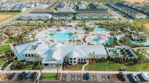 Enjoy a vibrant community with beautiful pools and lush landscaping just steps from your door. The colorful amenities provide a lively backdrop for relaxation and fun, with activities available for all ages to enjoy. - 5BR house sleeps 12 with game room in clermont (Clermont)
