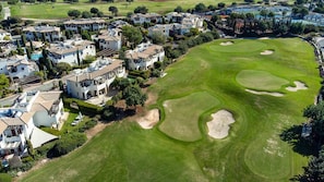A golf course with sand bunkers and a residential area with villas. - Apartment PA11 - Callysta (Kouklia)