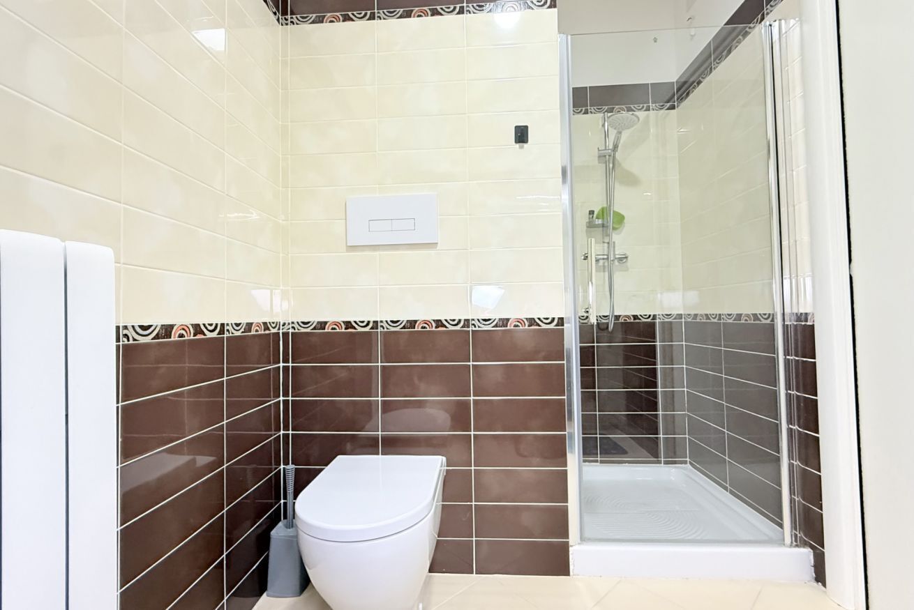 Ducha, bidet, toallas