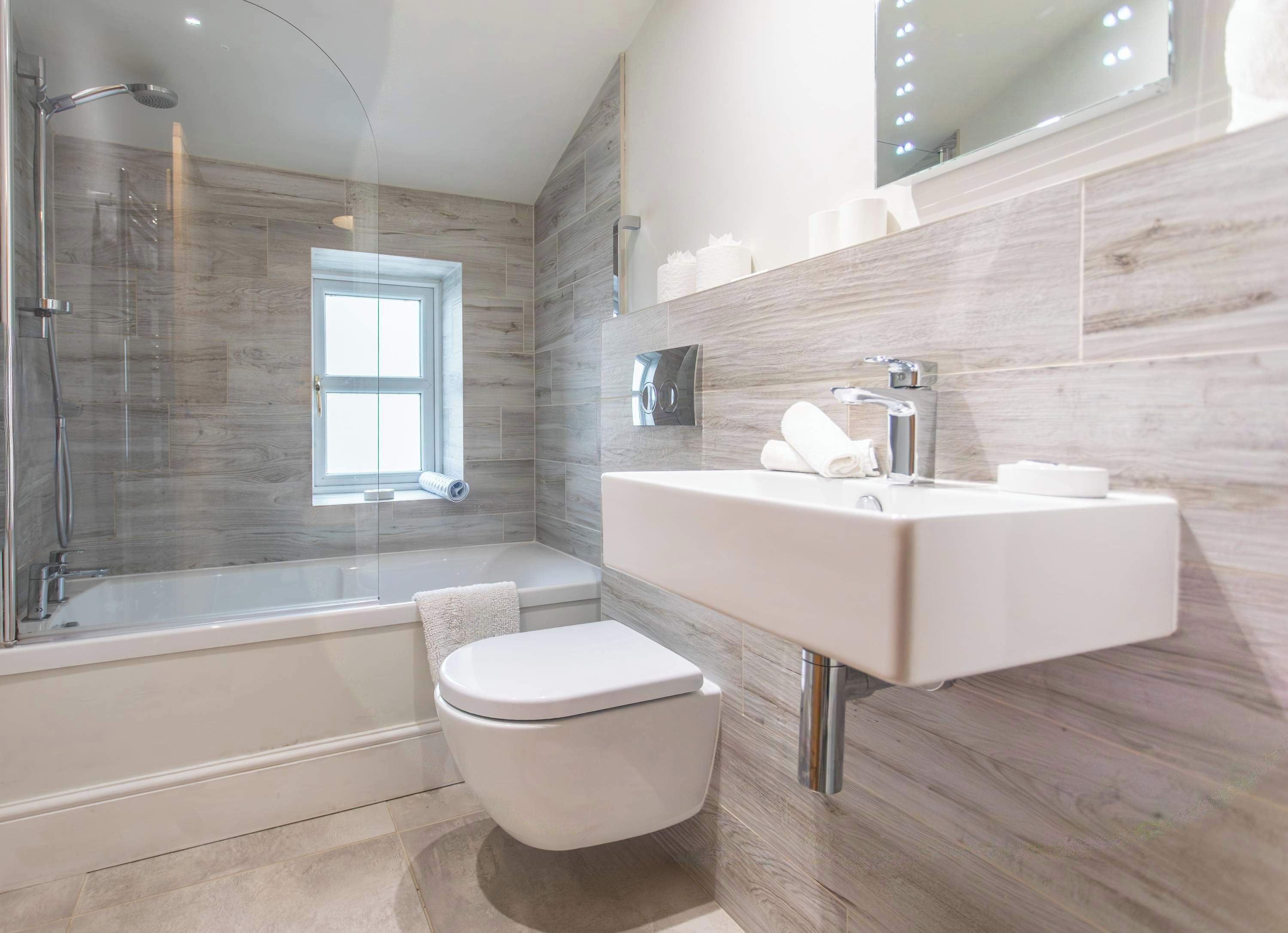 Shower, hair dryer, towels, shampoo