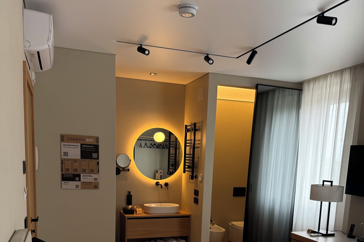 ห้องดีลักซ์ | เครื่องนอนระดับพรีเมียม, ผ้านวมขนเป็ด, เตียงพร้อมฟูกเสริมที่นอน