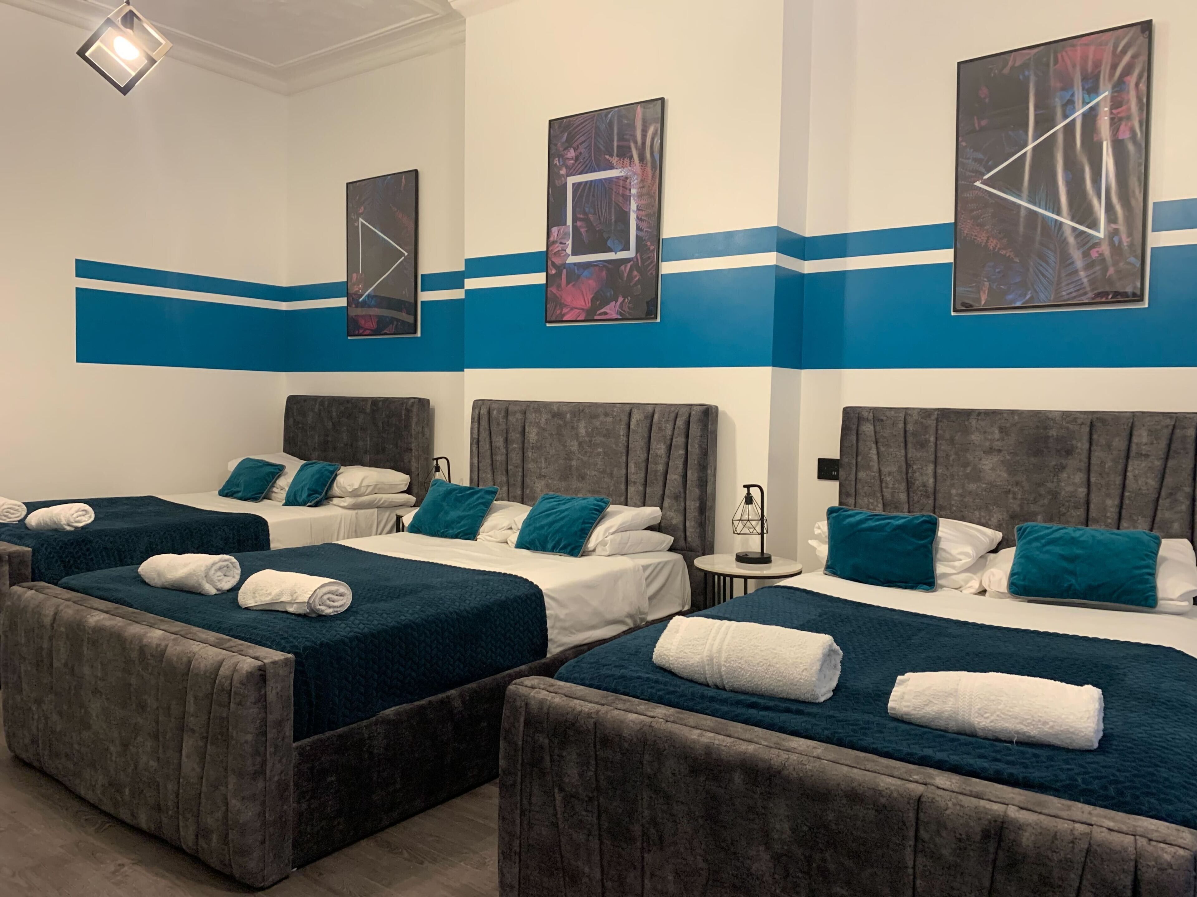 Standard Apartment, 2 Bedrooms, Ground Floor | Desk, laptop workspace, blackout curtains, iron/ironing board