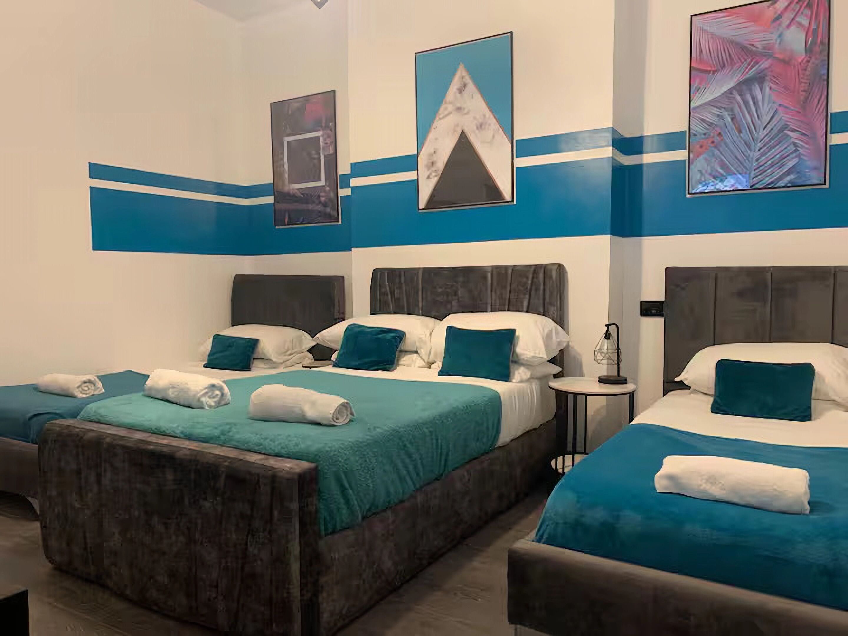 Apartment, 3 Bedrooms, Ground Floor | Desk, laptop workspace, blackout curtains, iron/ironing board