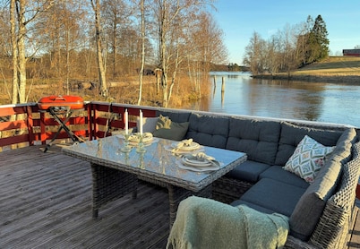 Moored houseboat on Haldenvassdraget
