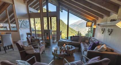 Chalet, Rez-de-chaussĂ©e, terrasse, balcon, cheminĂ©e ou poĂȘle Ă bois, tĂ©lĂ©vision, casier Ă ski, 158mÂČ