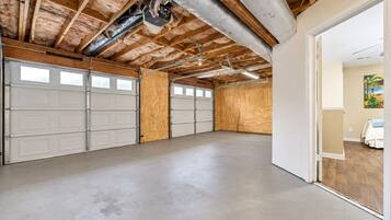 This Suite Stays Atlanta property includes a garage adjoining the lower-level living spaces.
