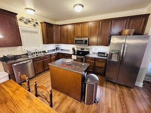 Fridge, dishwasher, coffee/tea maker, toaster