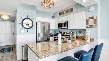 Coffee/tea maker, fridge, microwave, oven