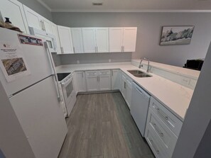 Private kitchen - The Coastal Catch Ground-Floor Oasis near Beach, Pool & Golf (Little River)