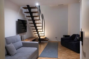 Quarto quádruplo standard | Área de estar