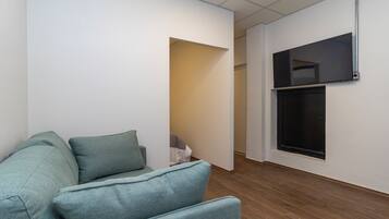 Apartamento família | Área de estar