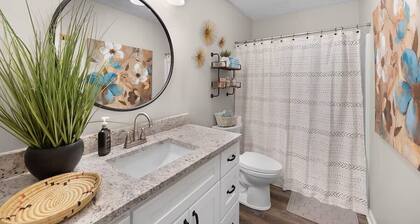 Relaxing 2BR 1BA Townhome • Loaded Amenities • Central Location Near I-40