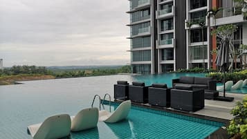 Outdoor pool, free pool cabanas, pool umbrellas