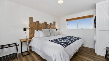 2 habitaciones, tabla de planchar con plancha y cuna de viaje