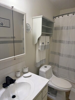 Hair dryer, towels, soap, shampoo - “Stylish Durham Townhome Near Duke + Unique Glow Room! 2 bedrooms, WiFi & Alexa” (Durham)