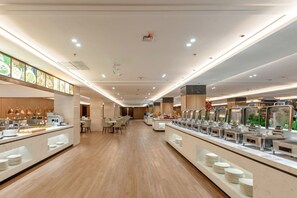 A modern hotel lobby with a long reception desk, seating area, and buffet. - Shanxidasha - All Inclusive (Beijing)