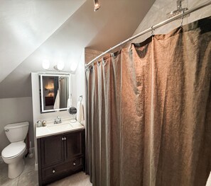 Hair dryer, towels, soap, shampoo
