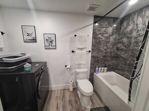 Hair dryer, towels, soap, shampoo