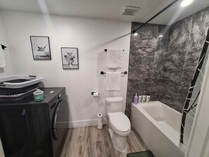 Hair dryer, towels, soap, shampoo