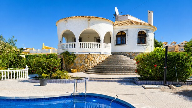 A white building with a pool, stone steps, and a white railing. - Private Pool Villa La Siesta (El Chaparral)