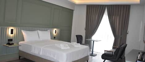 Standard Double Room, Non Smoking, Housekeeping | Minibar, in-room safe, desk, laptop workspace