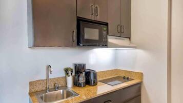Fridge, microwave, stovetop, coffee/tea maker
