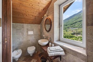 Shower, eco-friendly toiletries, hair dryer, bidet